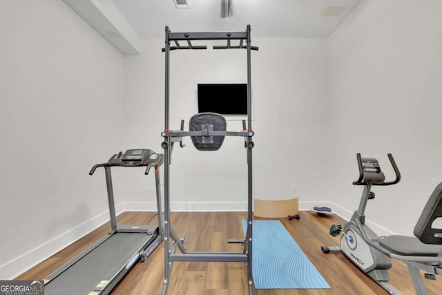 1025 Saint Marks Walk, Suwanee, GA 30024 - workout area with wood finished floors and baseboards