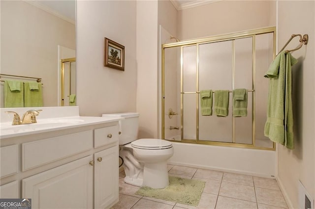 4045 Bonnett Creek Ln, Hoschton, GA 30548 - bathroom featuring vanity, toilet, bath / shower combo with glass door, ornamental molding, and tile patterned floors