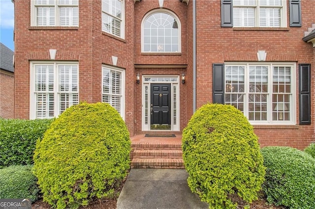 4045 Bonnett Creek Ln, Hoschton, GA 30548 - doorway to property featuring brick siding