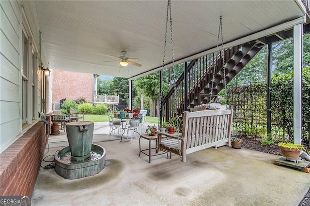 4045 Bonnett Creek Ln, Hoschton, GA 30548 - view of patio / terrace with stairs, outdoor dining space, and a ceiling fan