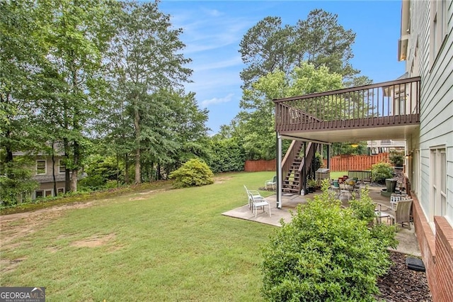 4045 Bonnett Creek Ln, Hoschton, GA 30548 - view of yard featuring stairs, a patio area, and a wooden deck