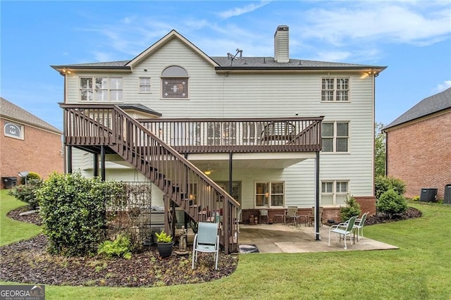 4045 Bonnett Creek Ln, Hoschton, GA 30548 - rear view of house featuring a patio area, a wooden deck, stairway, and a lawn