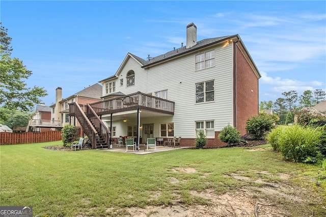 4045 Bonnett Creek Ln, Hoschton, GA 30548 - back of property with stairway, a deck, a patio area, and a chimney