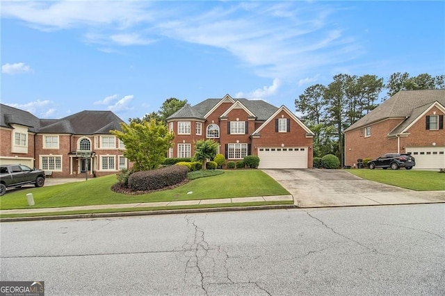 4045 Bonnett Creek Ln, Hoschton, GA 30548 - view of front facade featuring driveway, a front yard, and an attached garage