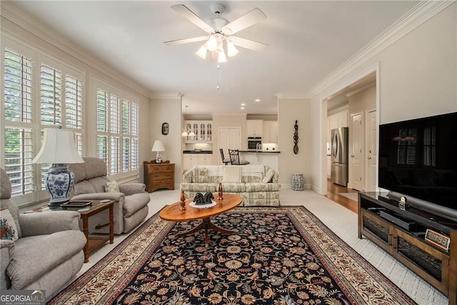 4045 Bonnett Creek Ln, Hoschton, GA 30548 - living room featuring a ceiling fan, crown molding, baseboards, and light colored carpet