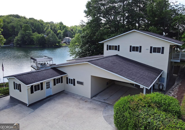 327 Chatuge Village Cir, Hayesville, NC 28904 - view of front of home featuring a water view, concrete driveway, and roof with shingles