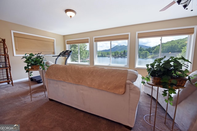 327 Chatuge Village Cir, Hayesville, NC 28904 - living area featuring carpet floors, ceiling fan, and baseboards