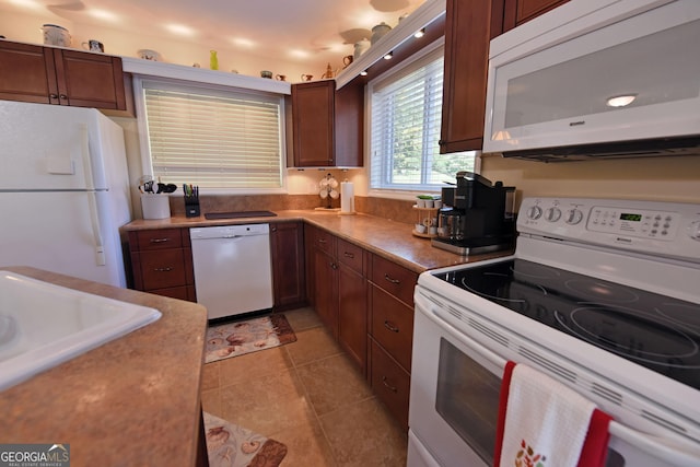 327 Chatuge Village Cir, Hayesville, NC 28904 - kitchen with white appliances, a sink, and light tile patterned flooring