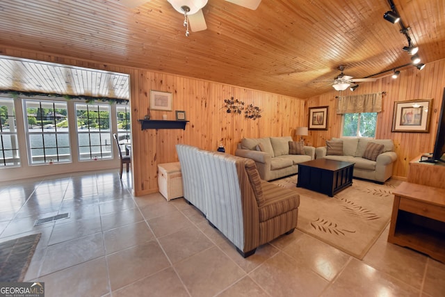 327 Chatuge Village Cir, Hayesville, NC 28904 - tiled living area featuring rail lighting, ceiling fan, wooden ceiling, wooden walls, and lofted ceiling