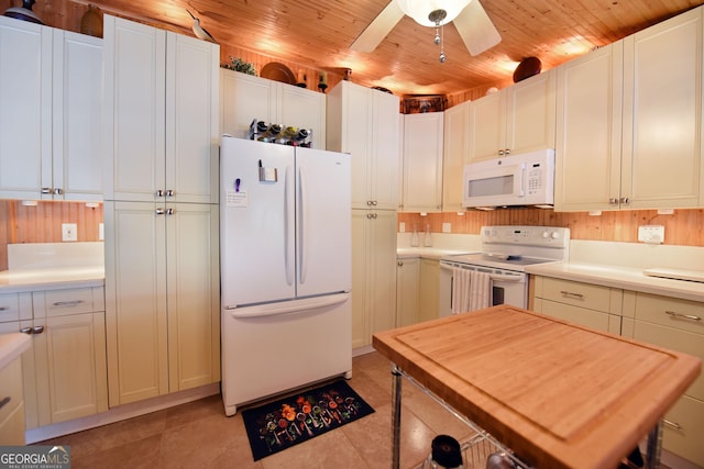 327 Chatuge Village Cir, Hayesville, NC 28904 - kitchen with white appliances, light countertops, wood ceiling, a ceiling fan, and light tile patterned flooring