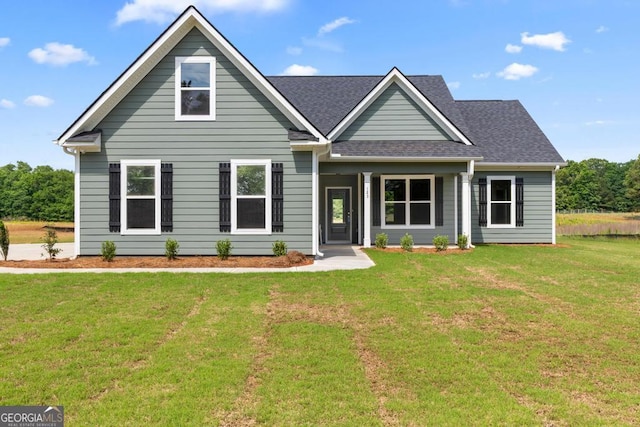 123 Oak Rd, Locust Grove, GA 30248 - view of front of home featuring a front yard and a shingled roof