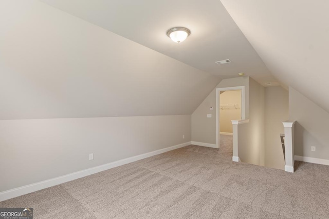 123 Oak Rd, Locust Grove, GA 30248 - bonus room featuring lofted ceiling, carpet, and baseboards
