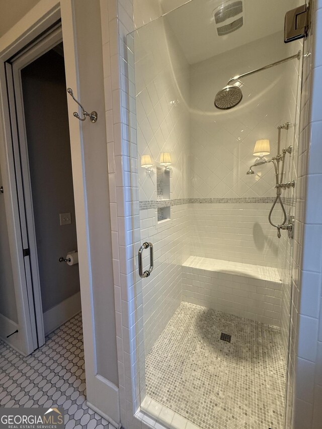 10583 Serenbe Ln, Palmetto, GA 30268 - full bathroom with a shower stall and tile patterned floors