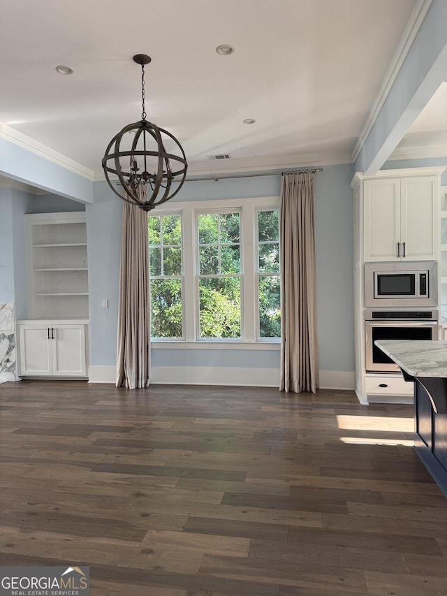 10583 Serenbe Ln, Palmetto, GA 30268 - unfurnished dining area with crown molding, a chandelier, dark wood-type flooring, and recessed lighting