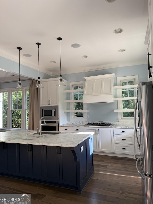 10583 Serenbe Ln, Palmetto, GA 30268 - kitchen with appliances with stainless steel finishes, premium range hood, crown molding, white cabinetry, and open shelves