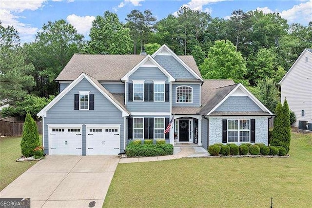 214 Crestmont Way, Canton, GA 30114 - traditional home featuring driveway, a front yard, an attached garage, and cooling unit