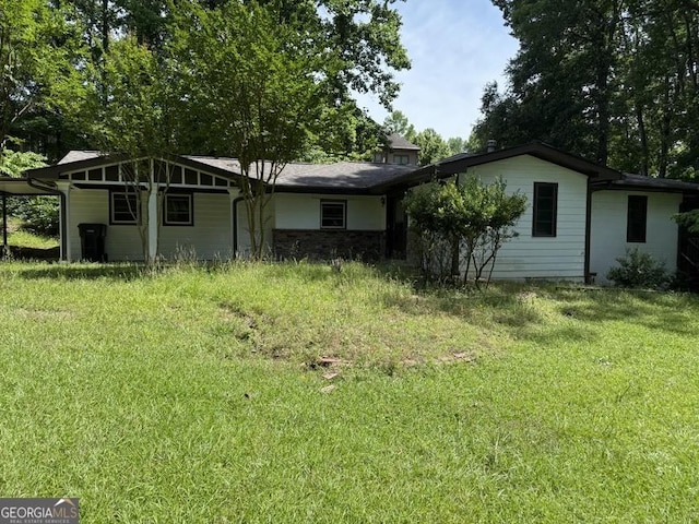 3136 Camp Branch Rd, Buford, GA 30519 - rear view of house featuring a yard