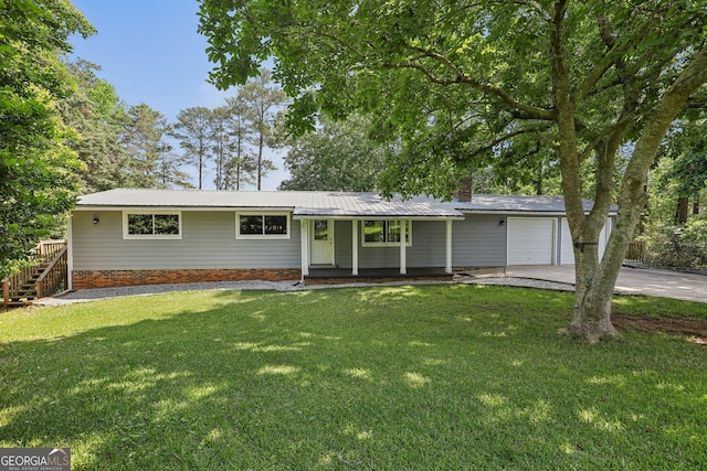 54 Owl Ct, Monticello, GA 31064 - ranch-style house with an attached garage, concrete driveway, a porch, and a front yard