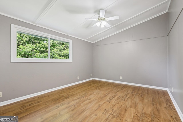 54 Owl Ct, Monticello, GA 31064 - empty room featuring lofted ceiling, ceiling fan, light wood finished floors, and baseboards