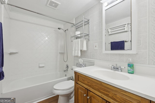54 Owl Ct, Monticello, GA 31064 - bathroom featuring toilet, tile walls, vanity, shower / tub combination, and wood finished floors