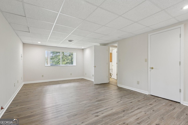 54 Owl Ct, Monticello, GA 31064 - spare room with a paneled ceiling, wood finished floors, and baseboards