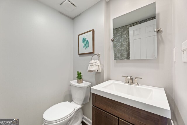 27 Jefferson Hill Pl NE, Atlanta, GA 30342 - bathroom featuring vanity and toilet