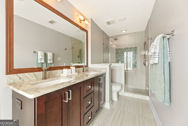 27 Jefferson Hill Pl NE, Atlanta, GA 30342 - bathroom featuring double vanity, tile patterned floors, and a shower stall