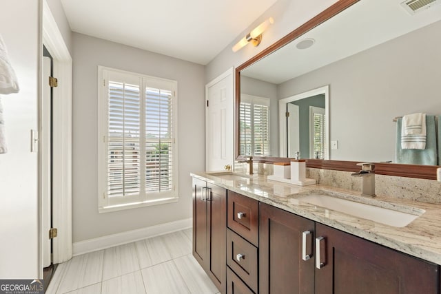 27 Jefferson Hill Pl NE, Atlanta, GA 30342 - full bath with double vanity and tile patterned floors
