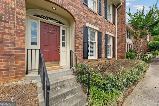 27 Jefferson Hill Pl NE, Atlanta, GA 30342 - view of exterior entry featuring brick siding