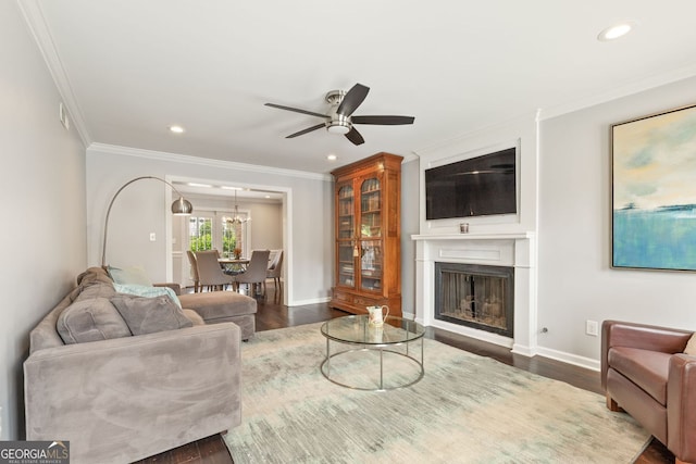 27 Jefferson Hill Pl NE, Atlanta, GA 30342 - living area with ornamental molding, ceiling fan, a fireplace, dark wood-type flooring, and recessed lighting