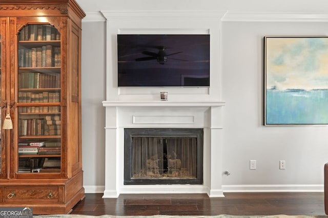27 Jefferson Hill Pl NE, Atlanta, GA 30342 - living area featuring ornamental molding, dark wood finished floors, ceiling fan, and a fireplace