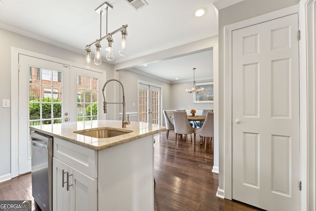27 Jefferson Hill Pl NE, Atlanta, GA 30342 - kitchen with dishwasher, ornamental molding, plenty of natural light, french doors, and a chandelier
