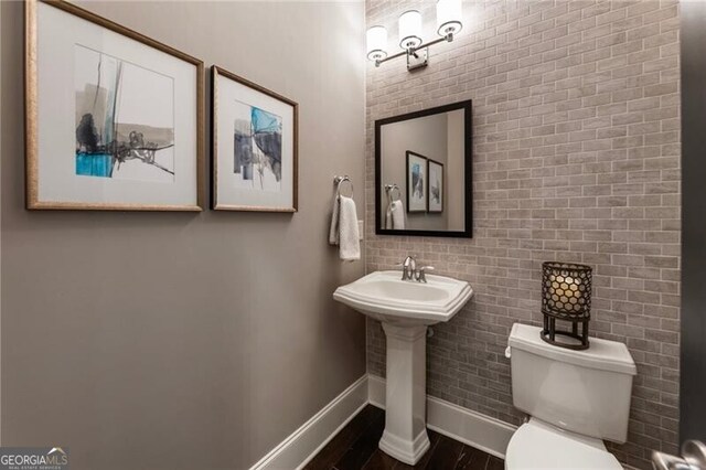 3000 Haven Mill Ln, Milton, GA 30004 - bathroom with baseboards and wood finished floors
