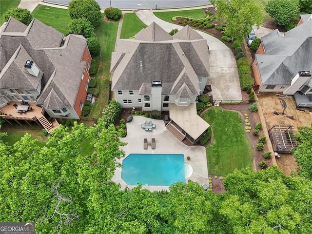 drone / aerial view of a pool area