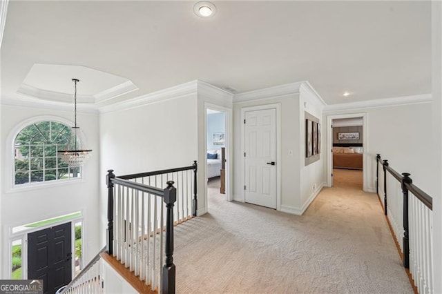 corridor featuring an upstairs landing, crown molding, carpet, baseboards, and recessed lighting
