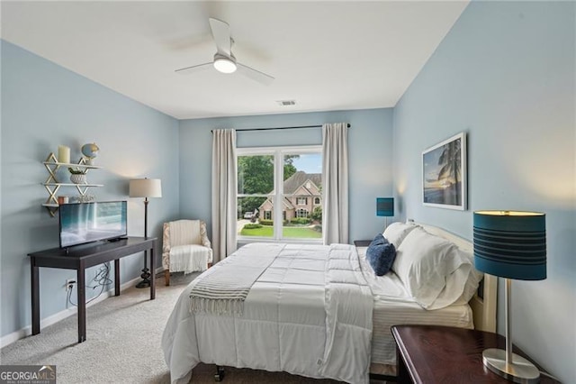 bedroom with carpet, baseboards, and a ceiling fan
