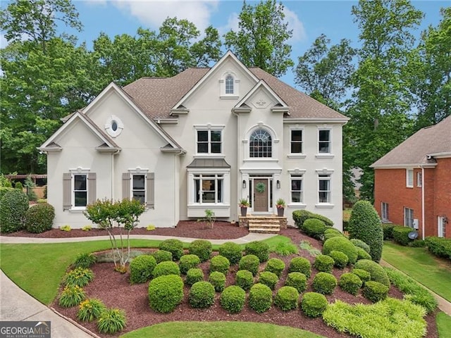 view of front of house featuring stucco siding