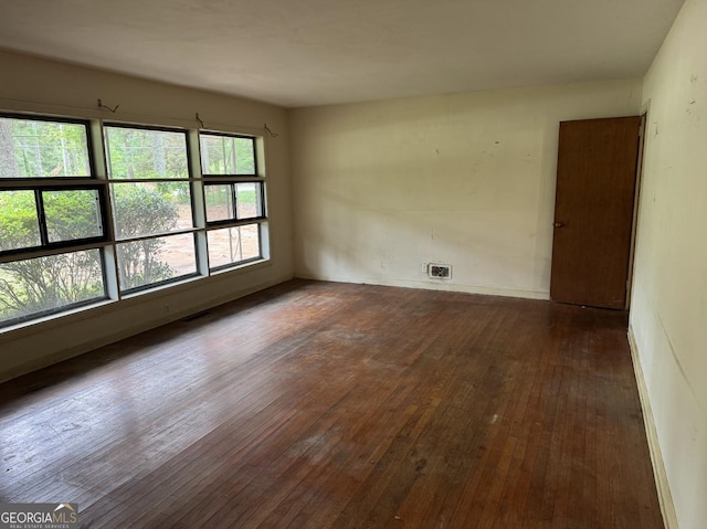 4720 Ben Hill Rd, South Fulton, GA 30349 - unfurnished room featuring dark wood-style floors and baseboards