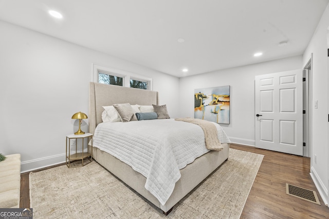 1870 Avon Ave SW, Atlanta, GA 30311 - bedroom with wood finished floors and recessed lighting