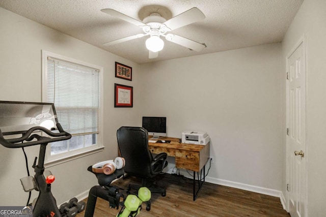 office featuring wood finished floors, a ceiling fan, a textured ceiling, and baseboards