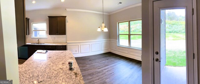 395 Brooks Village Dr, Pendergrass, GA 30567 - unfurnished dining area featuring dark wood-style floors, crown molding, a sink, wainscoting, and recessed lighting