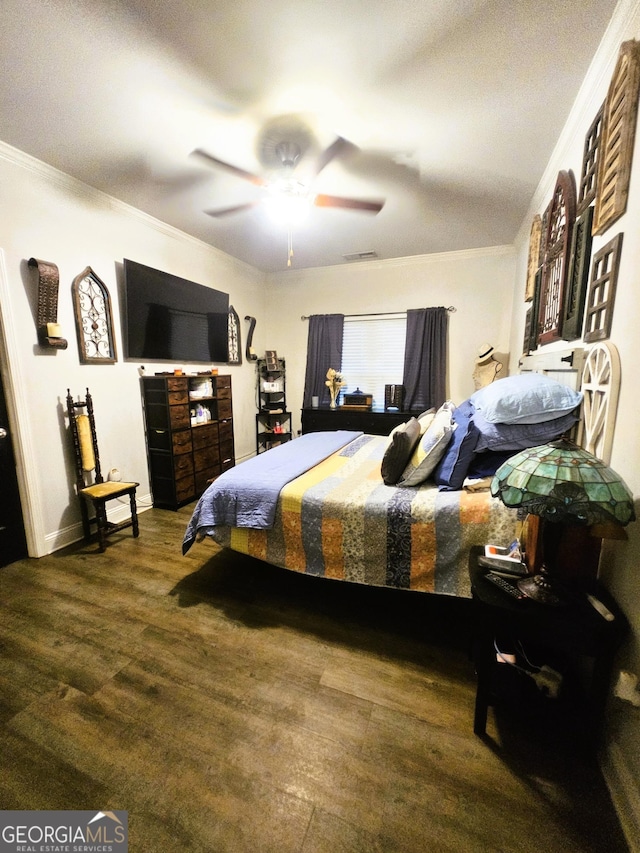395 Brooks Village Dr, Pendergrass, GA 30567 - bedroom with crown molding, wood finished floors, a ceiling fan, and baseboards