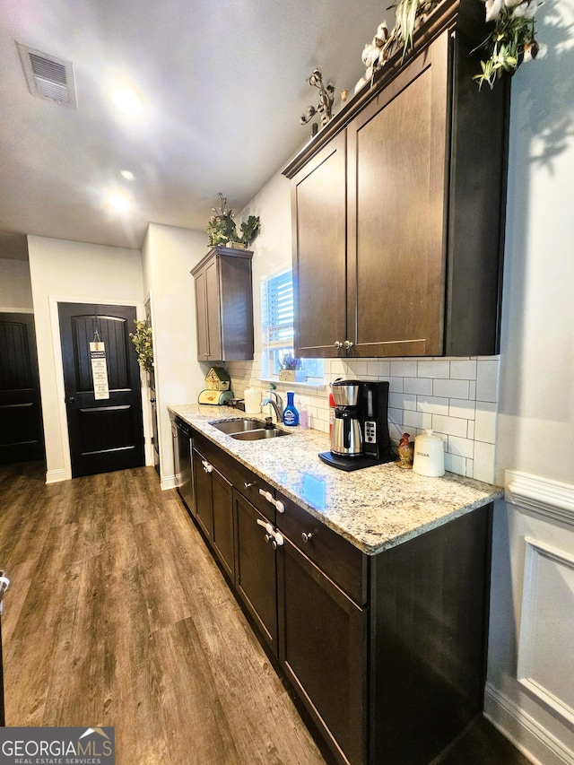 395 Brooks Village Dr, Pendergrass, GA 30567 - kitchen with a sink, backsplash, dark brown cabinets, dark wood-style floors, and dishwasher