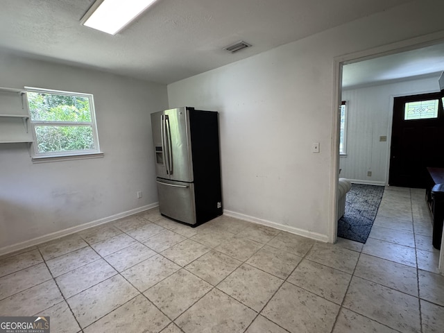 13327 US Highway 17, Woodbine, GA 31569 - empty room featuring light tile patterned floors