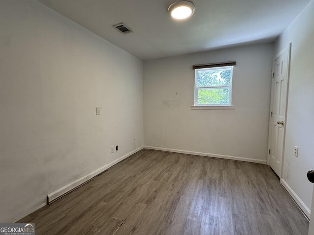 13327 US Highway 17, Woodbine, GA 31569 - unfurnished room featuring wood finished floors and baseboards