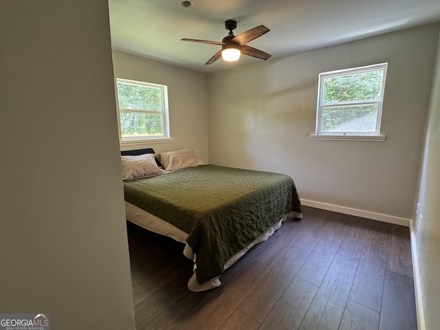 13327 US Highway 17, Woodbine, GA 31569 - bedroom with dark wood-style flooring and a ceiling fan