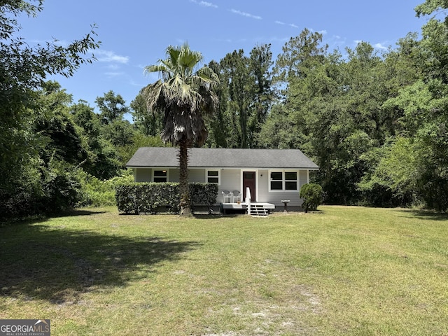 13327 US Highway 17, Woodbine, GA 31569 - back of house featuring a lawn