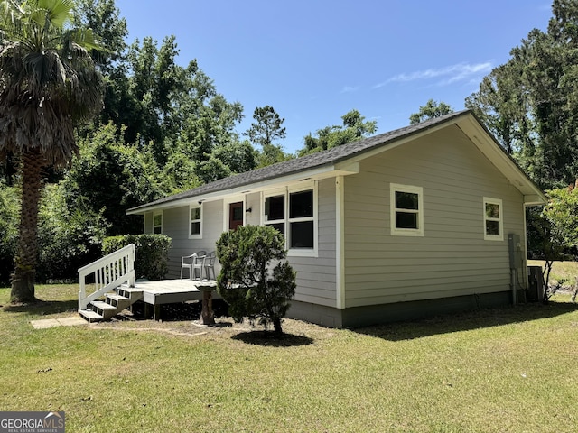 13327 US Highway 17, Woodbine, GA 31569 - back of property with a wooden deck and a lawn