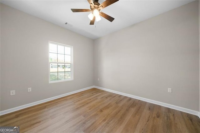 389 Campground School Rd, Dallas, GA 30157 - spare room featuring baseboards, ceiling fan, and light wood-style floors