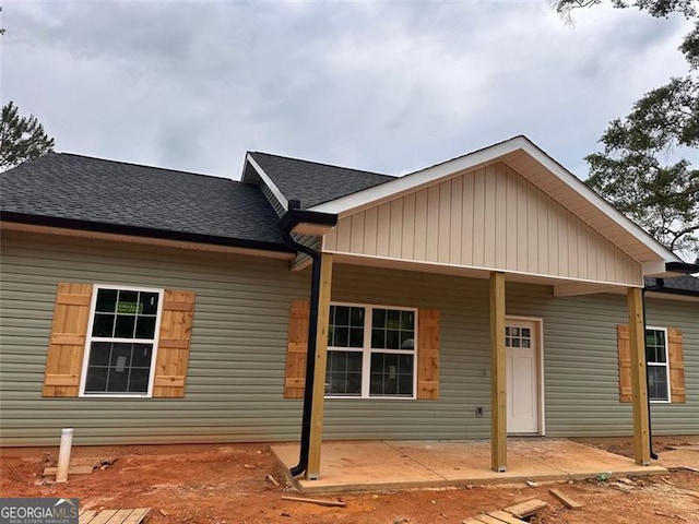 389 Campground School Rd, Dallas, GA 30157 - view of front of house with a shingled roof and a patio area